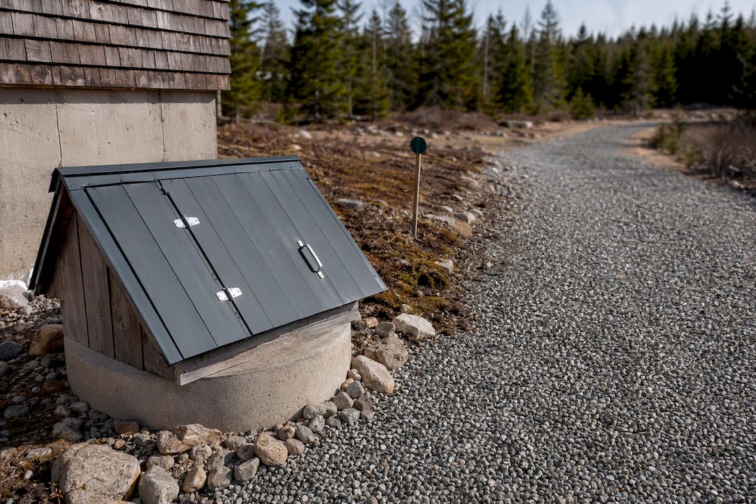 Well head beside rural Maine access lane